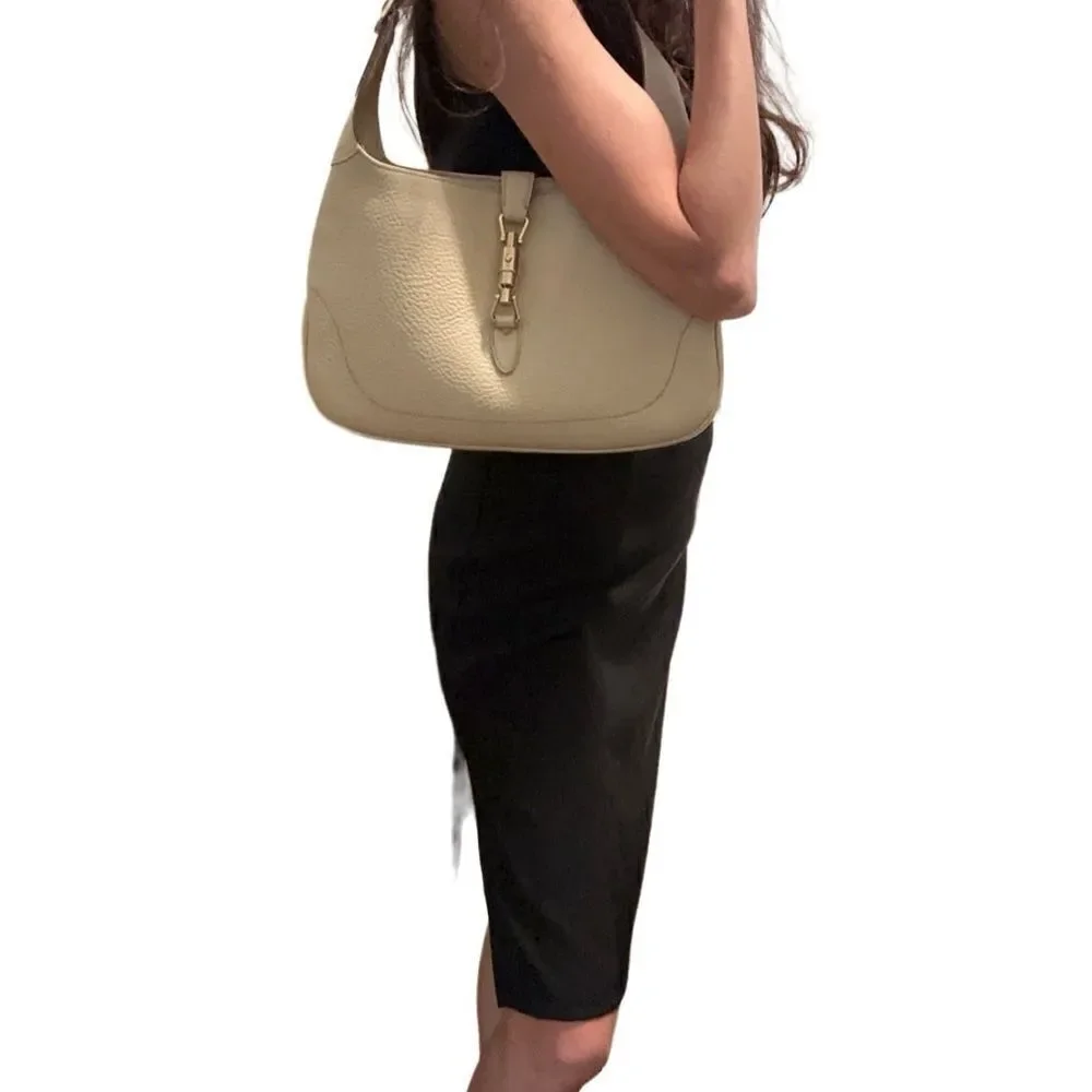 Gucci beiges leather Jackie bag with silver piston lock